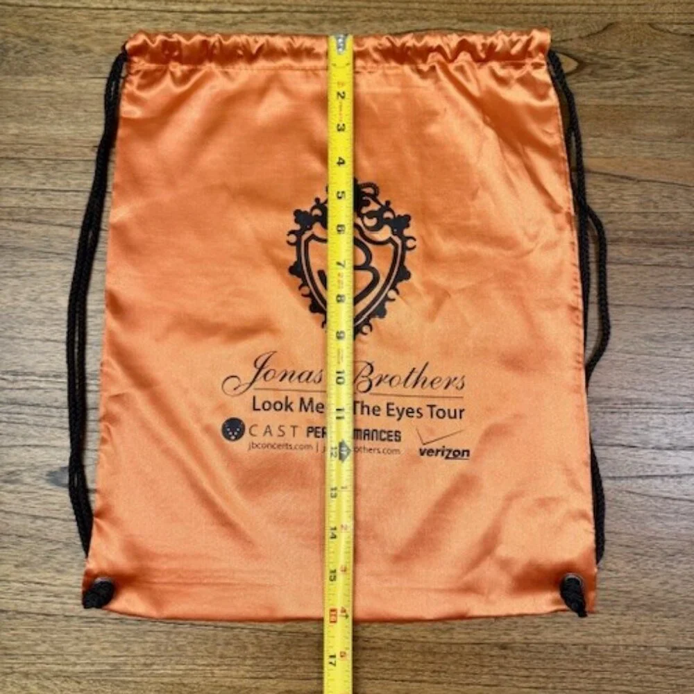 JONAS BROTHERS Orange Drawstring Bag